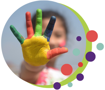 colorful paint on child hand image